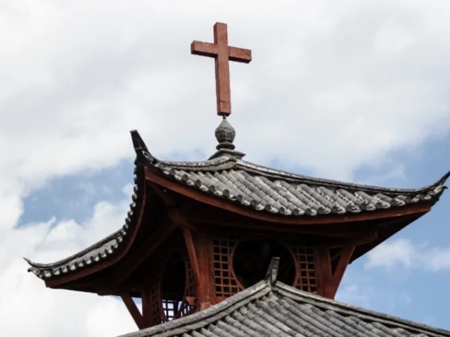 traditional chinese roof with cross